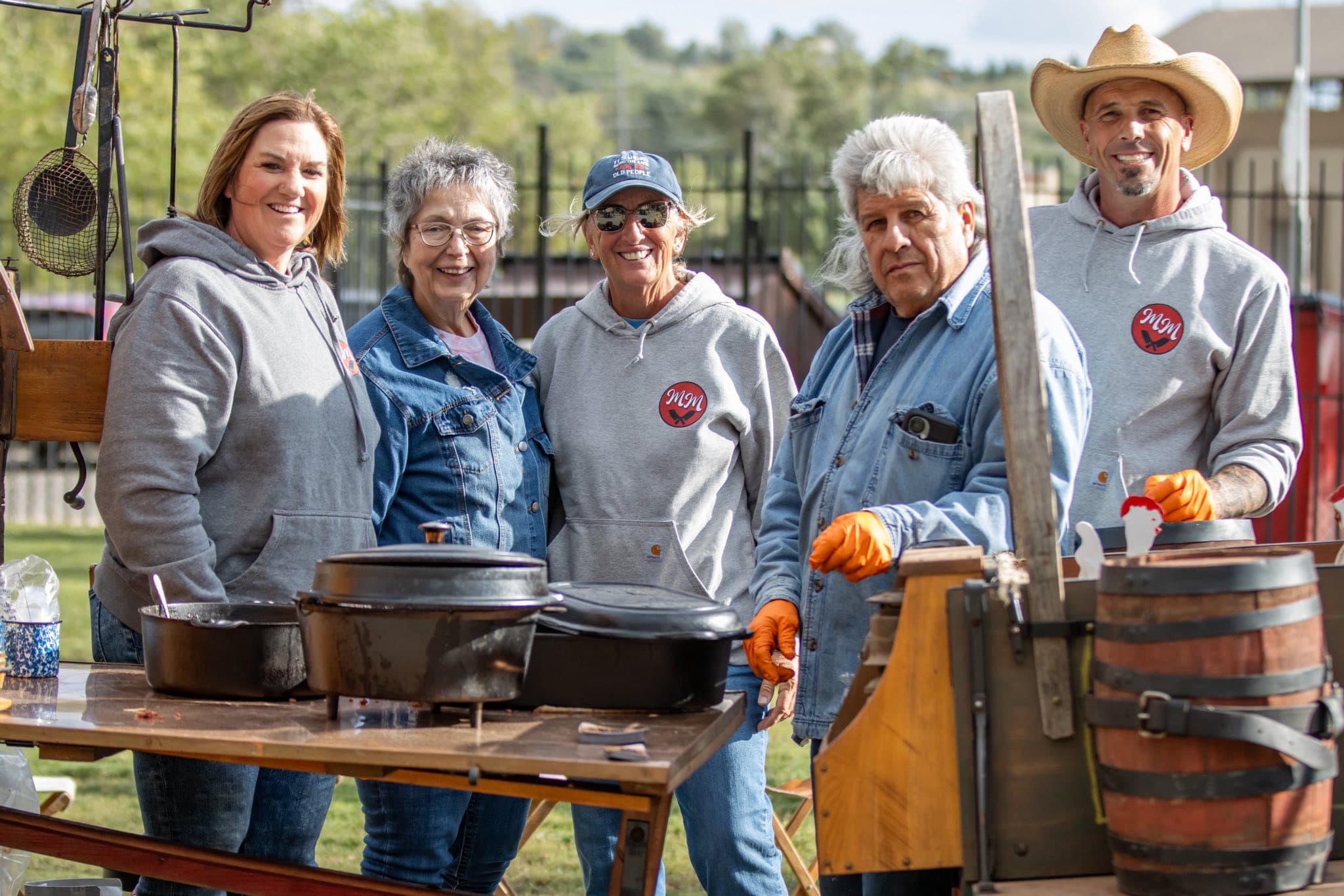 Mema's Meats team behind a cook station outdoors
